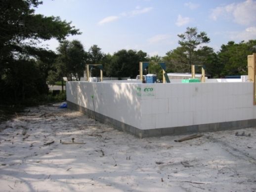 White foam ICF foundation walls on a concrete base