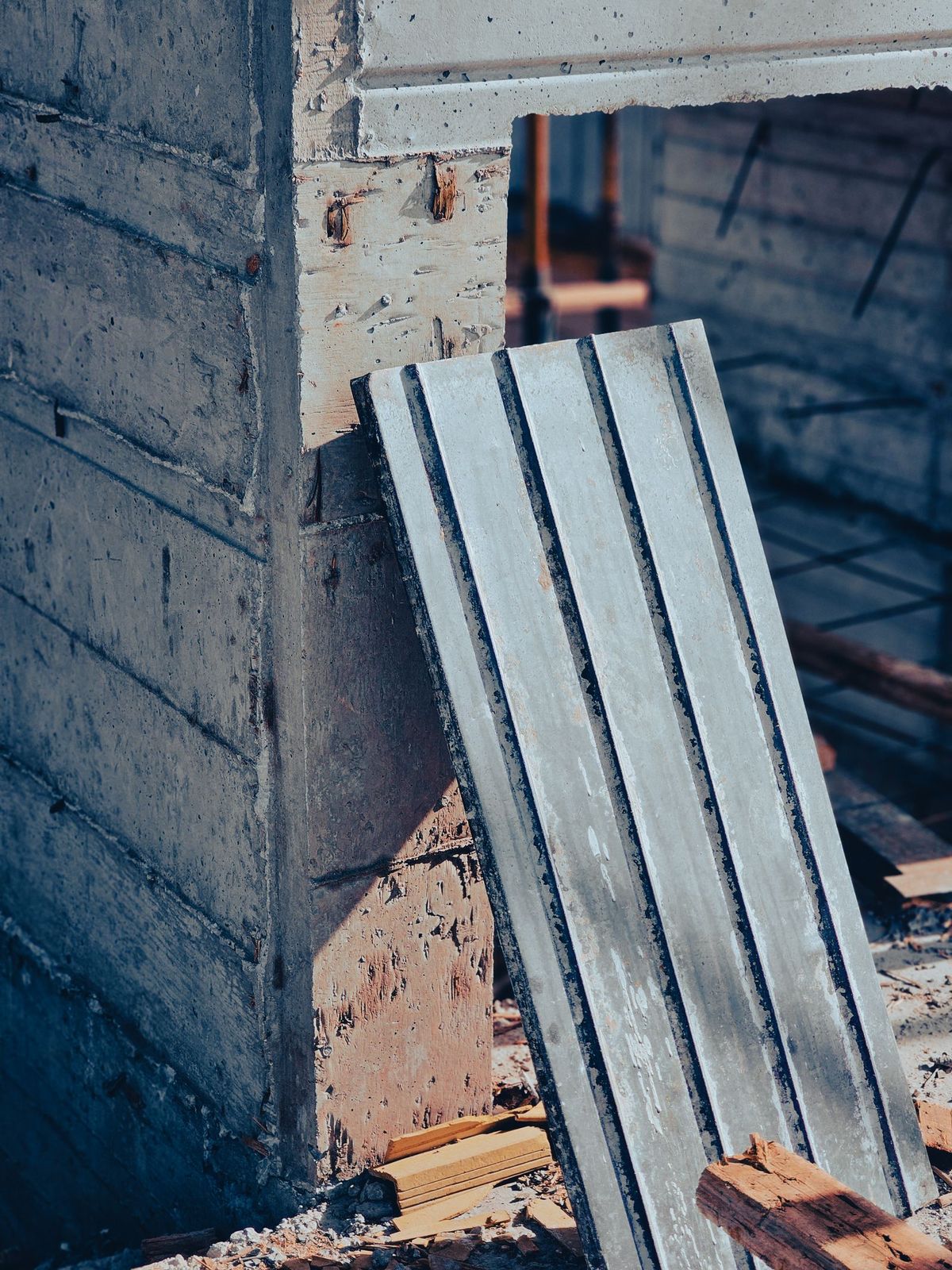 Poured concrete foundation wall with form marks